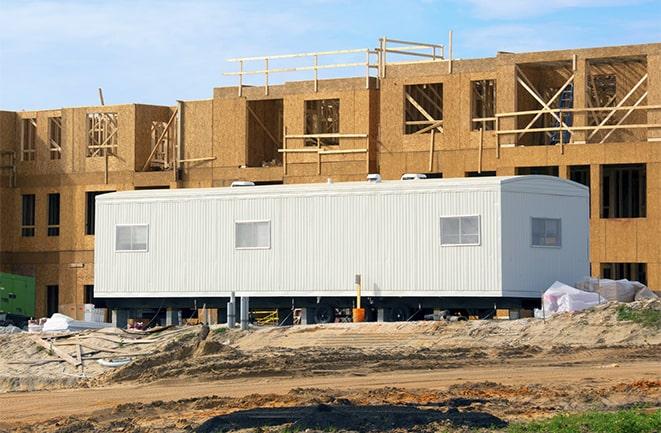 crane lifting modular building for construction office rentals in Citrus Heights, CA